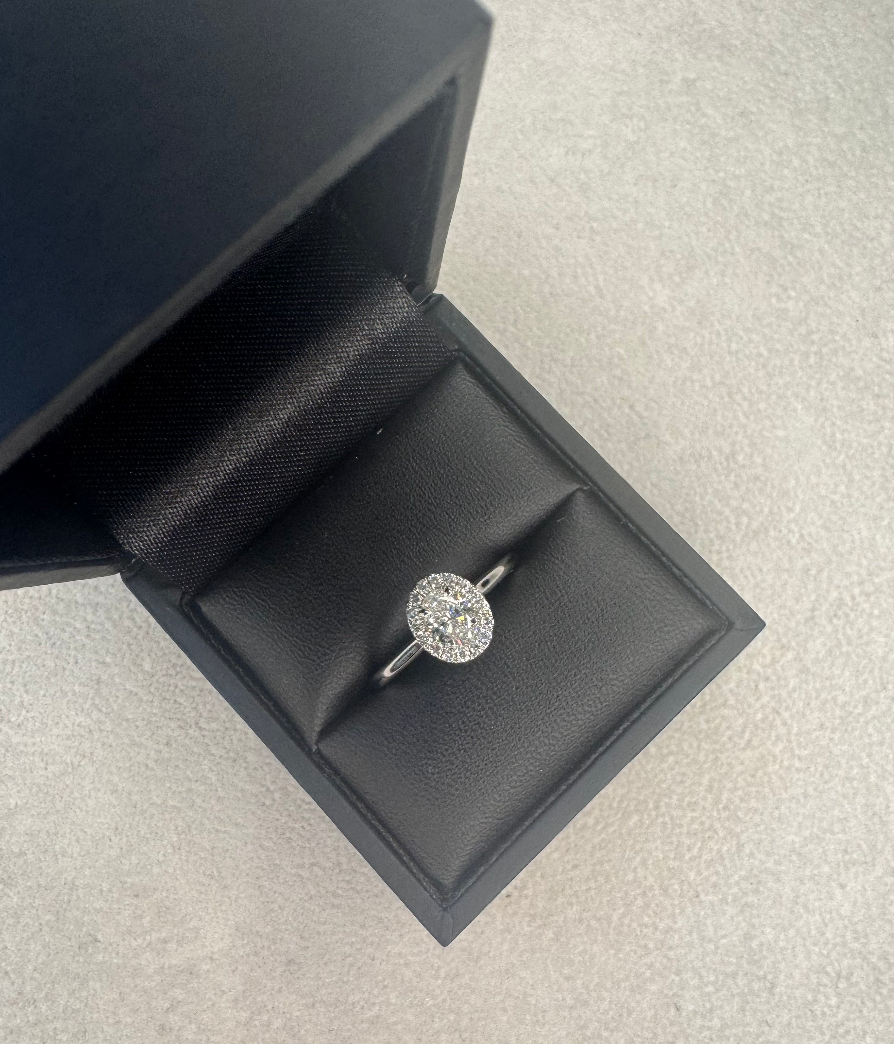 Platinum 0.50ct Oval Diamond Ring with Halo