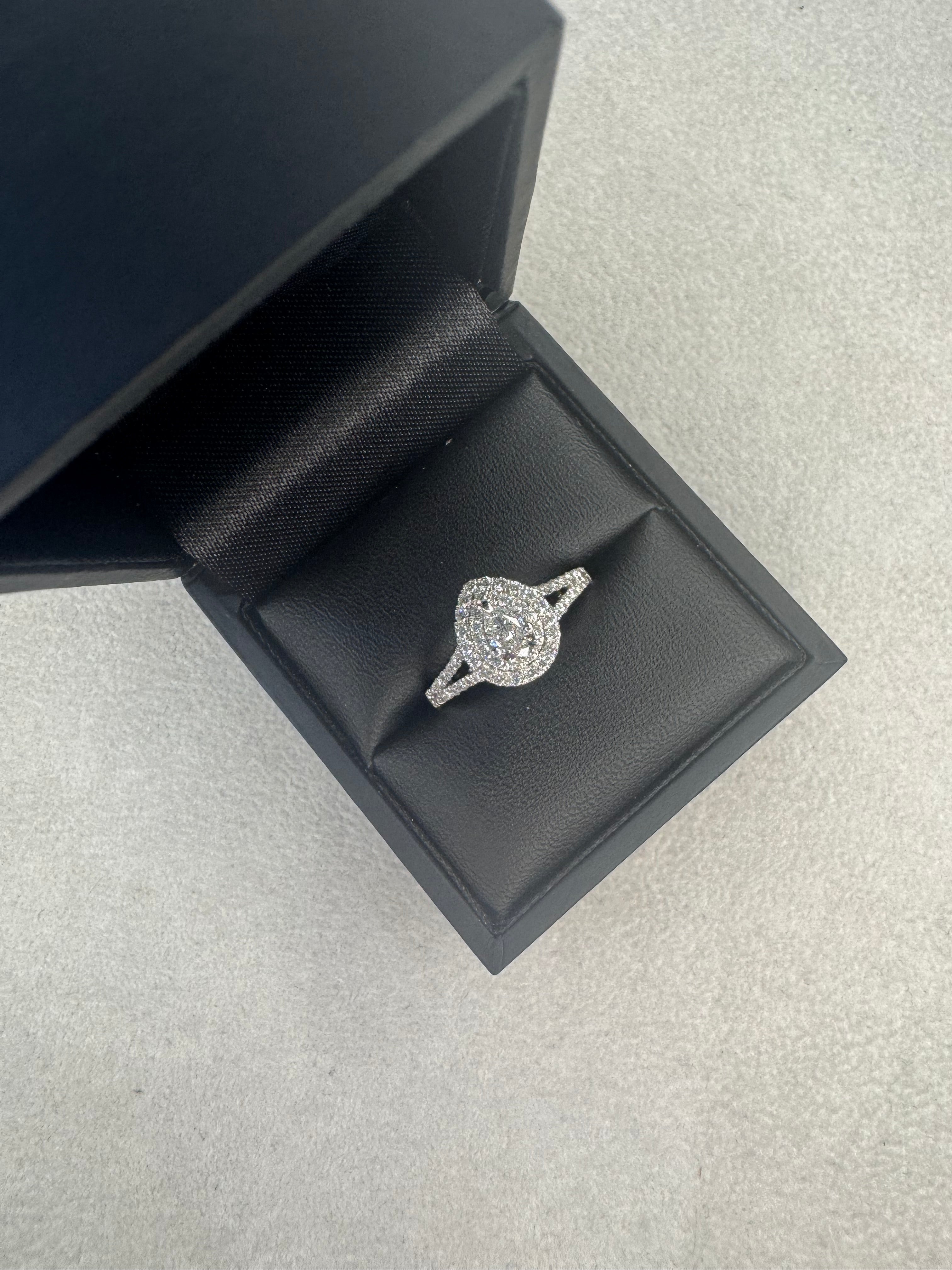 Platinum Pear Cut Solitaire With Double Halo