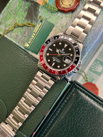 Rolex GMT Master II "Coke" (1999 Full Set & Rolex Service History) Swiss Only Dial