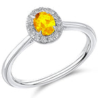 Platinum Oval Cut Yellow Sapphire and Diamond Ring