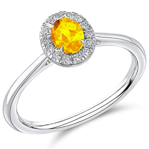 Platinum Oval Cut Yellow Sapphire and Diamond Ring