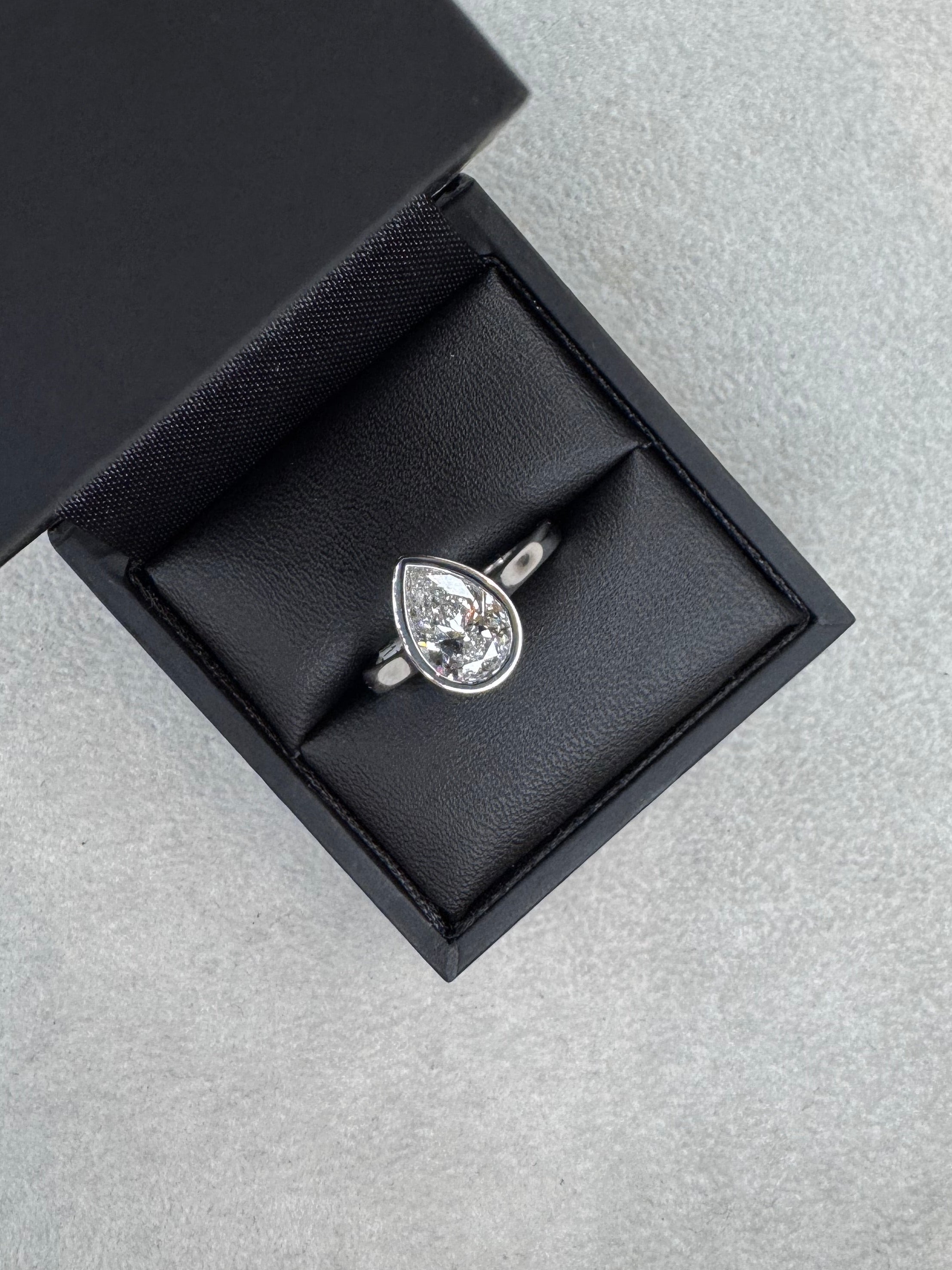 Platinum Pear Cut 1.51ct Lab Grown Diamond Bezel Set Ring