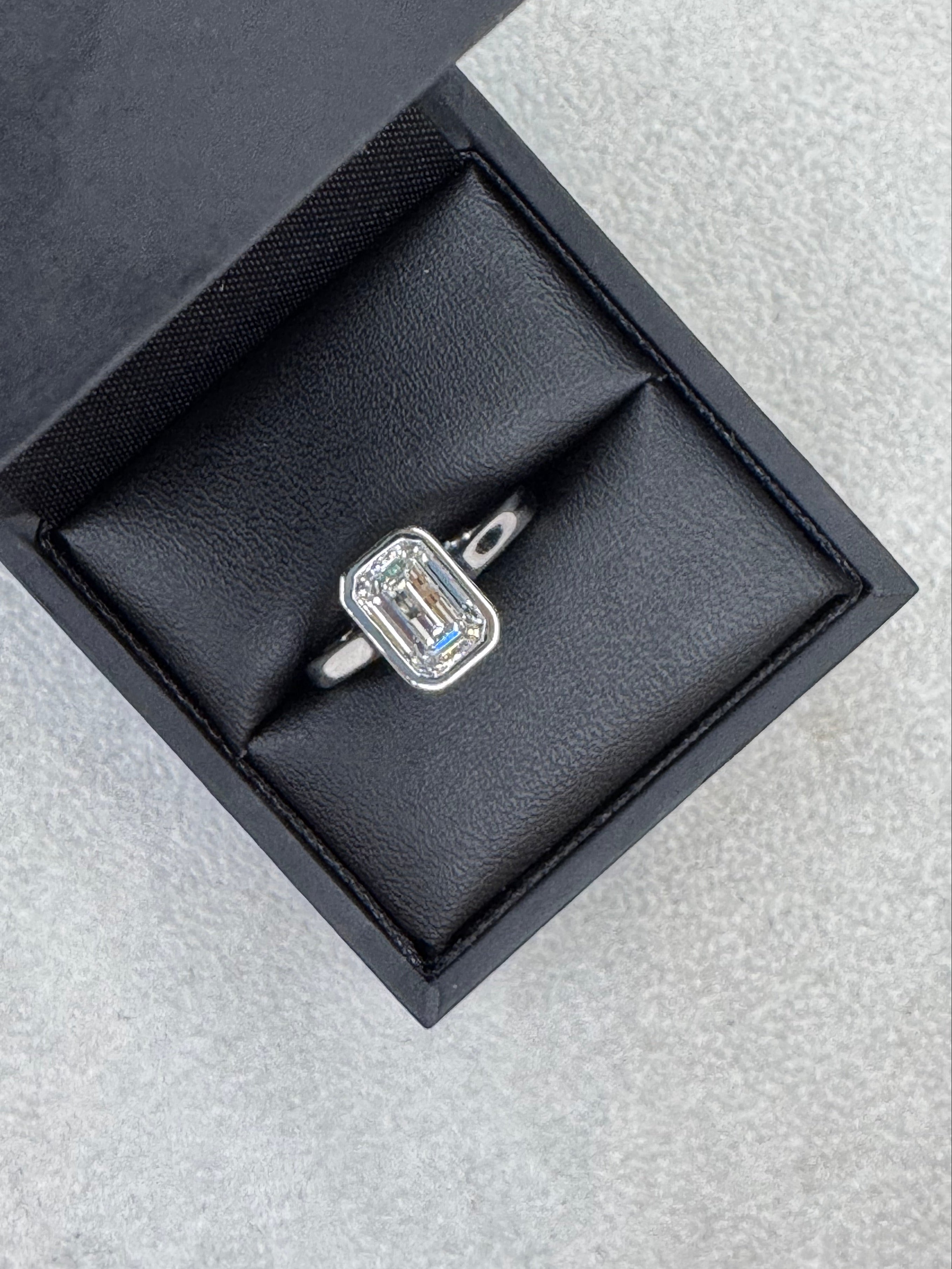Platinum Emerald Cut 1.58ct Lab Grown Diamond Bezel Set Ring