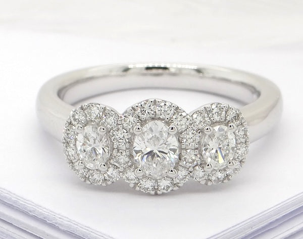 Platinum 3 Stone Oval Halo Diamond Ring